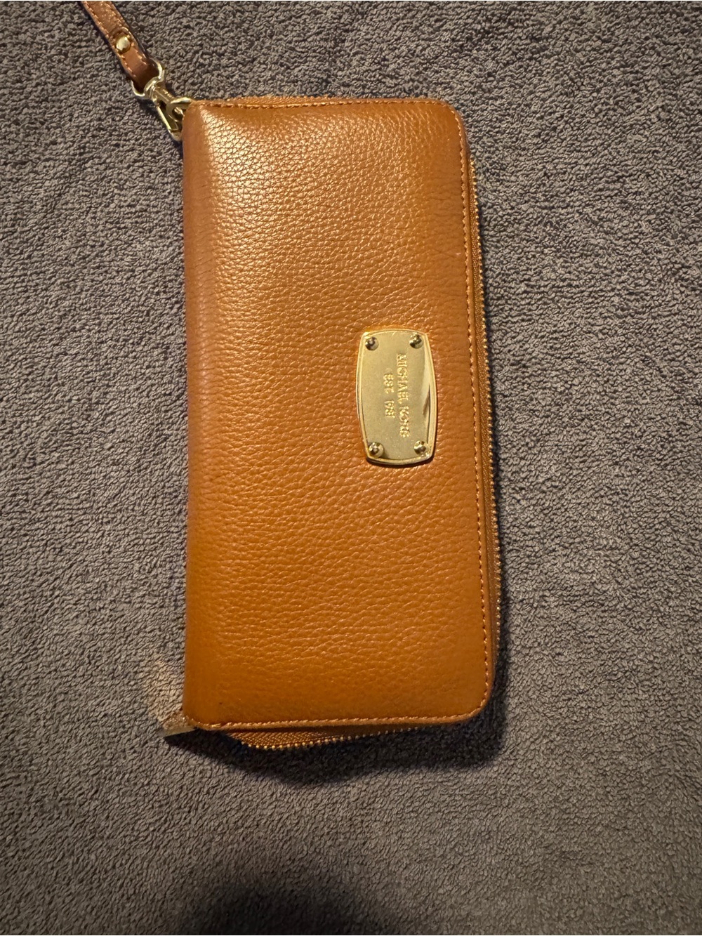 Michael Kors Cognac Pebbled Leather Wristlet with Gold Plaque